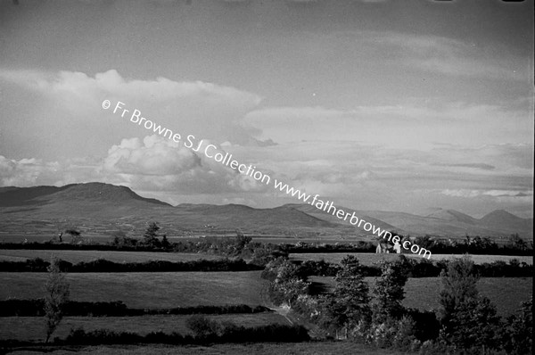 DISTANT VIEW OF CARLINGFORD AND MOURNE MOUNTAINS NEAR DILLONSTOWN